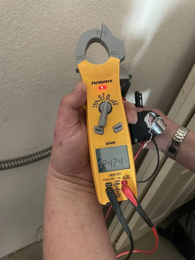 Voltage testing with clamp meter during Generator Installation in Van Wert